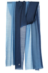 Denim Blue cashmere stole with blended blue ombré tones in a draped product view