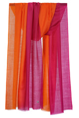 Sunset Tequila cashmere stole with a vivid warm-toned pink to orange ombré finish in a draped product view
